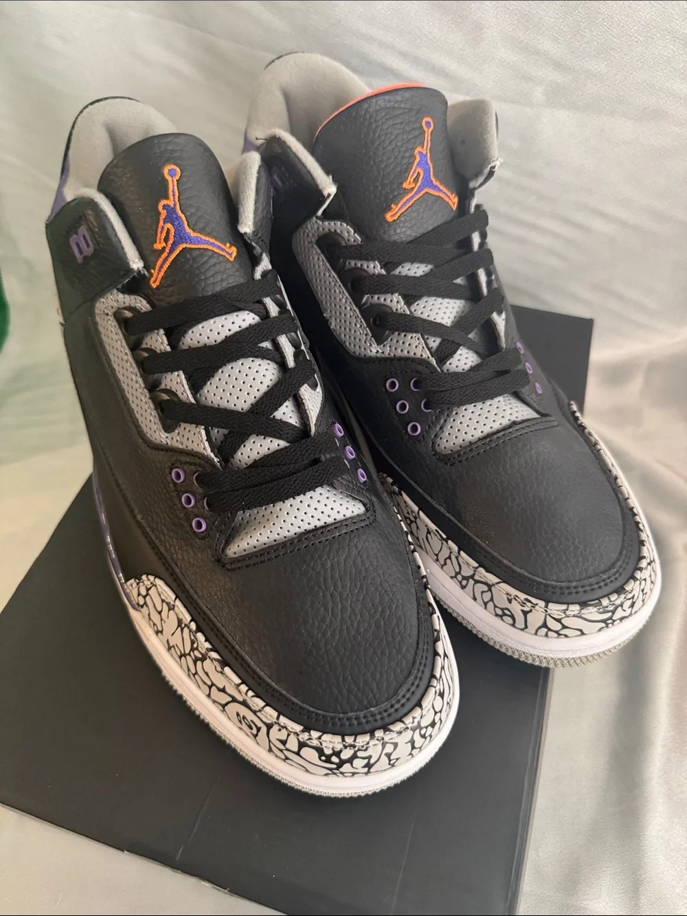 New! Air Jordan 3 Retro 'Court Purple' features a black tumbled leather upper!